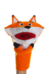 Fox puppet for show on hand against white background