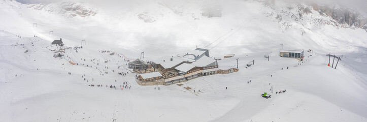 Panoramic aerial view of Sonnalpin restaurant in heavy snow below Zugspitze Top of Germany