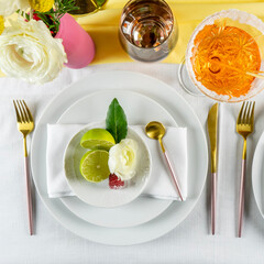 Spring table set for a party. Mise en place