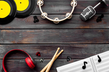 Fototapeta premium Music flat lay - instruments with vinyl records, overhead view