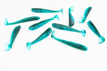 Jig silicone fishing lures isolated on a white background. Silicone fishing baits isolated....