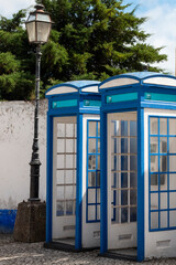 OBIDOS, PORTUGAL - 08-09-2020 : Souvenir shops and colorful narrow streets of the medieval portuguese city of &Oacute;bidos, a tourist attraction in central Portugal. famous destination for its architecture