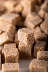Brown sugar cubes.  Food background.