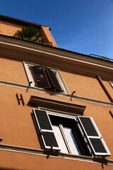 Window with shutters in Rome, Italy
