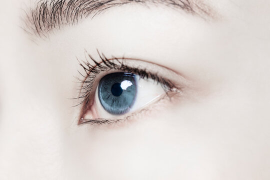 Woman's eye with smart contact lens