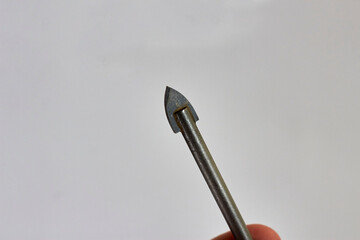 Drill bit for drilling on glass and ceramics