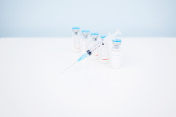 Vaccination, covid, syringe and amula layout