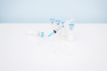 Vaccination, covid, syringe and amula layout