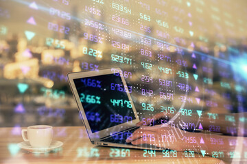 Fototapeta premium Double exposure of businesswoman hands typing on computer and forex chart hologram drawing. Financial analysis concept.