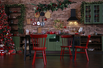 green kitchen interior with red fridge on brick wall background