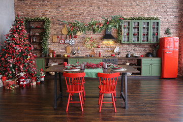 green kitchen interior with red fridge on brick wall background