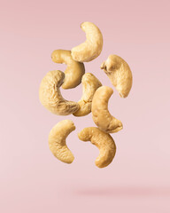 fresh cashew nut falling in the air