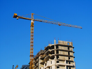 Construction site with crane and building. Construction site. Industrial background.