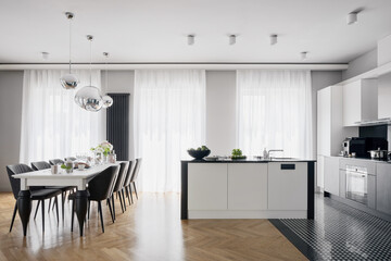 Spacious kitchen with dining table