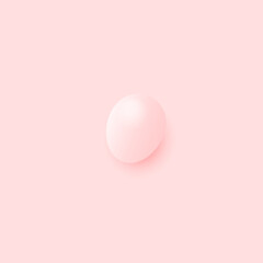 Pink egg on light green background. Easter event food.