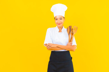 Portrait beautiful young asian chef woman with spatula