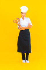 Portrait beautiful young asian chef woman with spatula