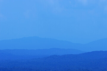 Hills in blue mist