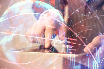 Multi exposure of man's hands holding and using a phone and financial chart drawing. Market analysis concept.