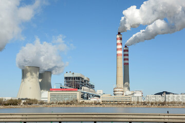 Under the background of sunny day, the appearance of a power plant is very beautiful