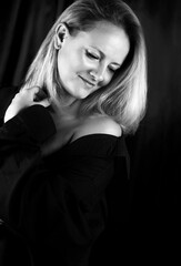 Black and white portrait of woman in studio