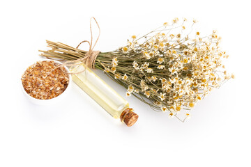 Composition with chamomile flowers and homemade cosmetic, essential oil, sopa,  on white...