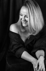 Black and white portrait of woman in studio