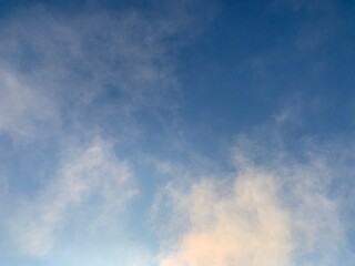 White mist against blue sky