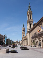 ZARAGOZA, SPAIN on SEPTEMBER 2019: Main Plaza del Pilar square in european city at Aragon district, clear blue sky in warm sunny summer day - vertical.