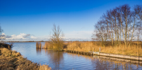 Fototapeta na wymiar Panorama of the Schildmeer lake in Groningen, Netherlands