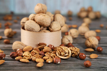 Nuts on wooden background