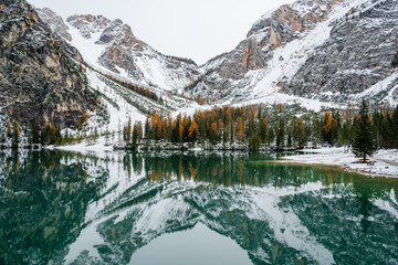winter landscape, with kaleidoscope effect on the side di braies located in the Italian alps in the area of ​​the dolomites. Snow, trees and mountains
