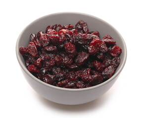 Dried cranberries in bowl isolated on white background