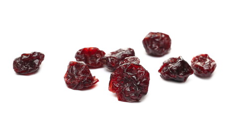 Dried cranberries pile isolated on white background