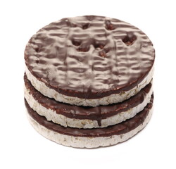 Rice cakes with chocolate topping stack isolated on white background