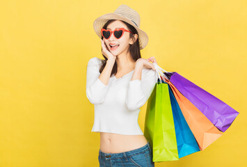 Happy Beautiful young woman with shopping bags