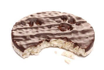 Bitten rice cake with chocolate topping isolated on white background
