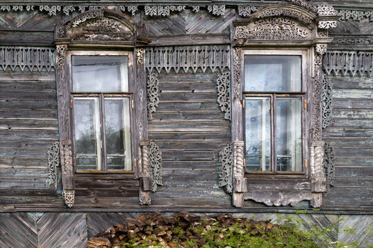 Russia, Tver region. Kalyazin district. Porechye. Old wooden house decorated with beautiful carvings of the estate of the Vinogradov brothers. Windows decorated with decorative carved platbands