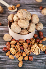 Nuts on wooden background
