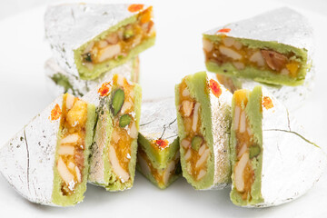 Most Enjoyed Kaju Diamond Barfi Or Burfi Mithai Assorted With Kaaju Mava Cashew Nuts Pista Kesar Mawa. The Sweet is Enjoyed Across Punjab Bengal Rajasthan Gujrat In North And South India