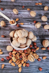 Nuts on wooden background
