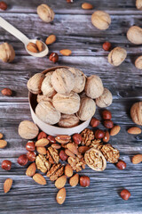 Nuts on wooden background