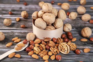 Nuts on wooden background