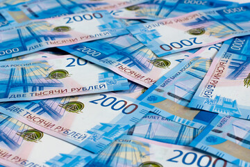 Background Of Paper Russian Money. New Russian Banknotes Of 2000 Two Thousands Rubles Close Up.