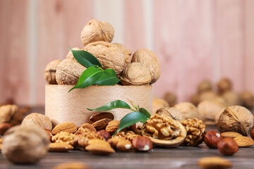 Nuts on wooden background