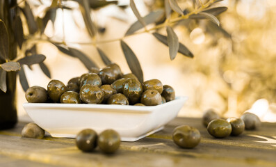 olives on table in an olive grove