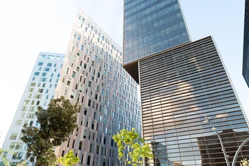 Fotobehang Skyscraper business office buildings in Barcelona. Modern futuristic technological architecture concept.  © Alvaro