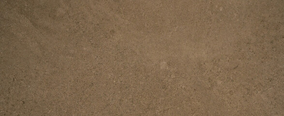 Fototapeta na wymiar Brown beige polished natural stone tiles / terrace slabs / granite marbled marble texture background banner panorama