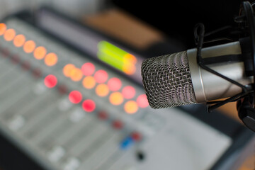 Professional microphone and sound mixer in radio station studio
