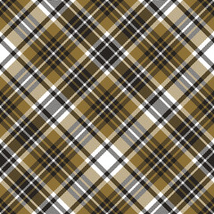 Plaid pattern in black, gold, white. Seamless herringbone textured dark contrast Scottish tartan check plaid for modern autumn and winter fashion textile print.
